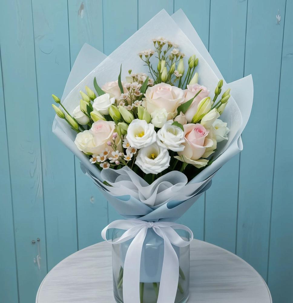 Букет цветов из: Розы и Лизиантусы в Тамале